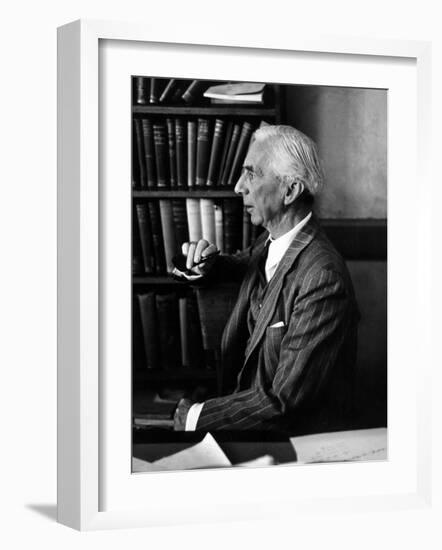 Bertrand Russell Sitting at His Desk at California University at Los Angeles-Peter Stackpole-Framed Photographic Print