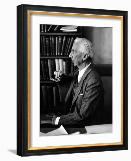 Bertrand Russell Sitting at His Desk at California University at Los Angeles-Peter Stackpole-Framed Photographic Print