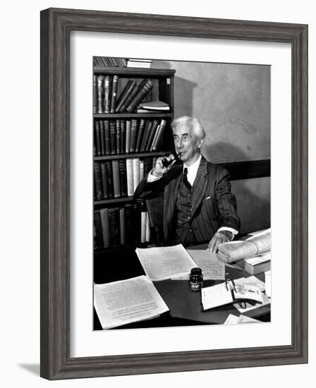 Bertrand Russell Sitting at His Desk at California University at Los Angeles-Peter Stackpole-Framed Photographic Print