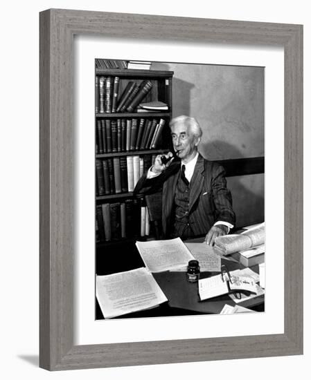 Bertrand Russell Sitting at His Desk at California University at Los Angeles-Peter Stackpole-Framed Photographic Print