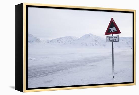 Beware of Polar Bear Traffic Sign on Ice Road-Stephen Studd-Framed Premier Image Canvas