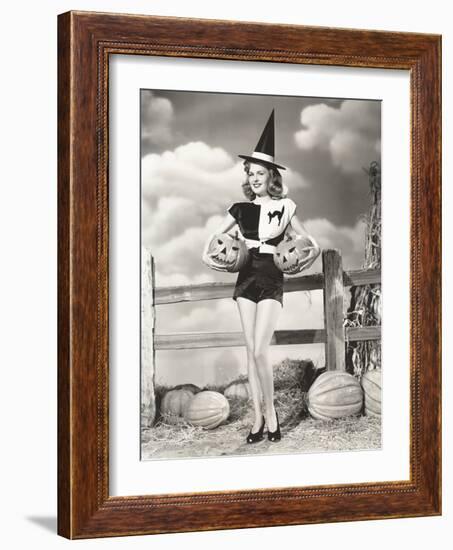 Bewitching Woman Carrying Carved Pumpkins-null-Framed Photo