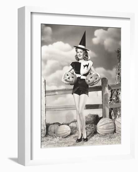 Bewitching Woman Carrying Carved Pumpkins-null-Framed Photo