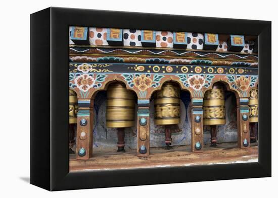 Bhutan, Paro, capital of Paro District, Dzongkhag. Traditional prayer wheels.-Cindy Miller Hopkins-Framed Premier Image Canvas