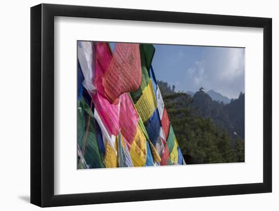 Bhutan, Paro. Colorful prayer flags in front of small outbuilding of the Tiger's Nest.-Cindy Miller Hopkins-Framed Photographic Print