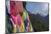 Bhutan, Paro. Colorful prayer flags in front of small outbuilding of the Tiger's Nest.-Cindy Miller Hopkins-Mounted Photographic Print