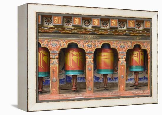 Bhutan, Paro. Spinning Prayer Wheel at the Rinpung Dzong-Brenda Tharp-Framed Premier Image Canvas