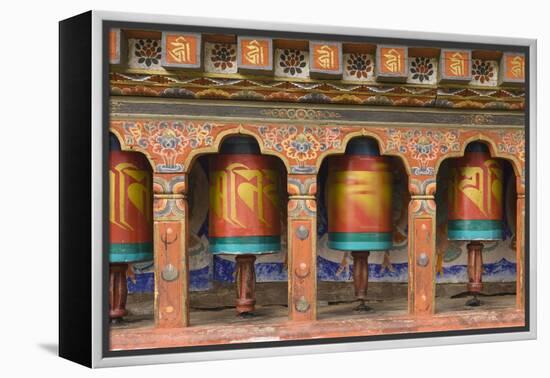 Bhutan, Paro. Spinning Prayer Wheel at the Rinpung Dzong-Brenda Tharp-Framed Premier Image Canvas