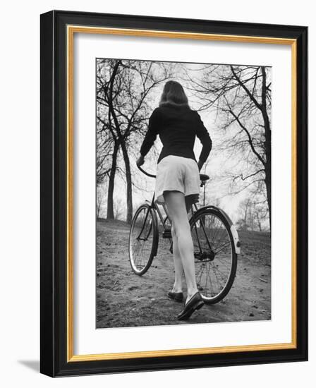 Bicycle Being Pushed by a Typical American Girl-Nina Leen-Framed Photographic Print
