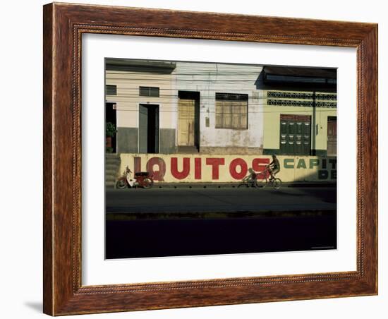 Bicycle Cruises Past Homes, Iquitos, Peru, South America-Aaron McCoy-Framed Photographic Print