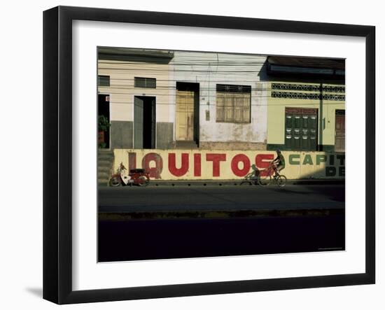 Bicycle Cruises Past Homes, Iquitos, Peru, South America-Aaron McCoy-Framed Photographic Print