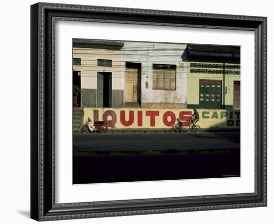 Bicycle Cruises Past Homes, Iquitos, Peru, South America-Aaron McCoy-Framed Photographic Print