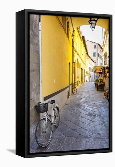 Bicycle parked at Via Degli Angeli, Lucca, Tuscany, Italy, Europe-John Guidi-Framed Premier Image Canvas