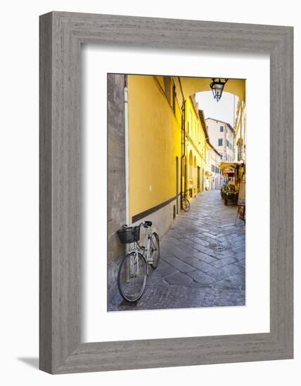 Bicycle parked at Via Degli Angeli, Lucca, Tuscany, Italy, Europe-John Guidi-Framed Photographic Print