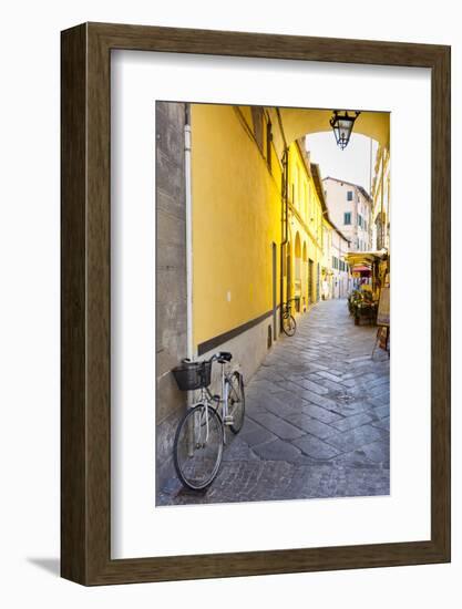 Bicycle parked at Via Degli Angeli, Lucca, Tuscany, Italy, Europe-John Guidi-Framed Photographic Print