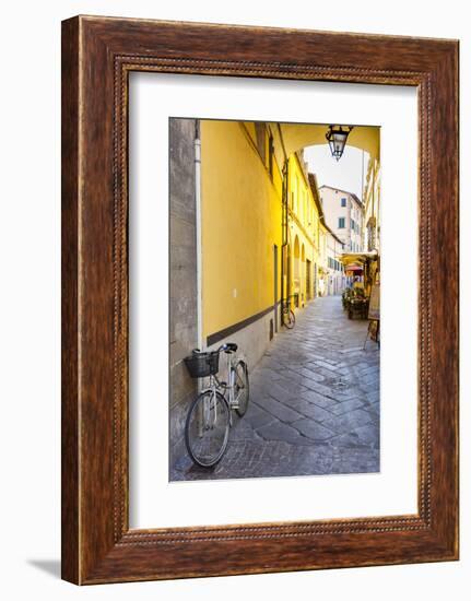 Bicycle parked at Via Degli Angeli, Lucca, Tuscany, Italy, Europe-John Guidi-Framed Photographic Print