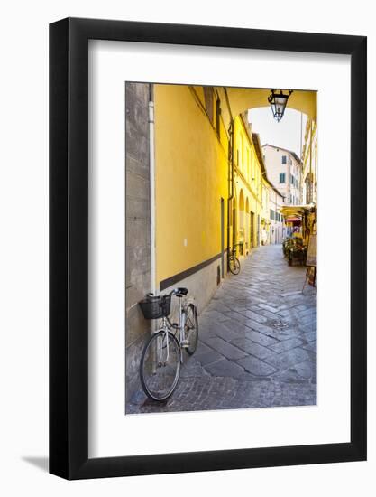 Bicycle parked at Via Degli Angeli, Lucca, Tuscany, Italy, Europe-John Guidi-Framed Photographic Print