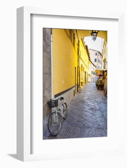 Bicycle parked at Via Degli Angeli, Lucca, Tuscany, Italy, Europe-John Guidi-Framed Photographic Print