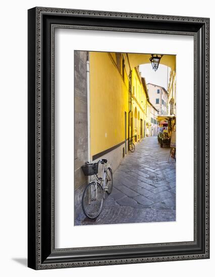 Bicycle parked at Via Degli Angeli, Lucca, Tuscany, Italy, Europe-John Guidi-Framed Photographic Print