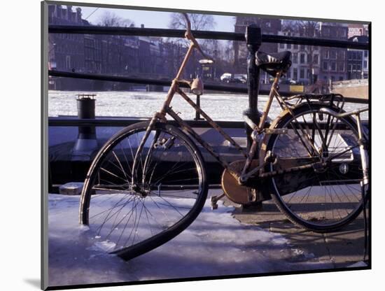 Bicycle Stuck in Frozen Canal, Amsterdam, Netherlands-Michele Molinari-Mounted Photographic Print