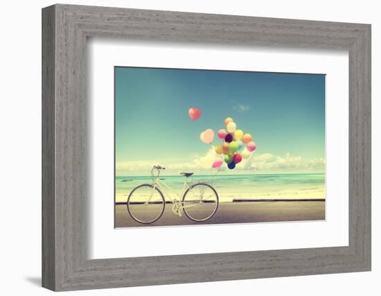 Bicycle Vintage with Heart Balloon on Beach Blue Sky Concept of Love in Summer and Wedding-jakkapan-Framed Photographic Print