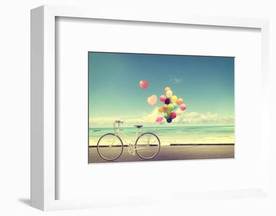 Bicycle Vintage with Heart Balloon on Beach Blue Sky Concept of Love in Summer and Wedding-jakkapan-Framed Photographic Print