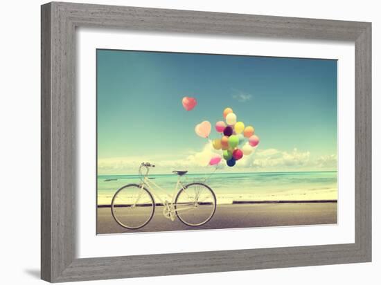 Bicycle Vintage with Heart Balloon on Beach Blue Sky Concept of Love in Summer and Wedding-jakkapan-Framed Photographic Print