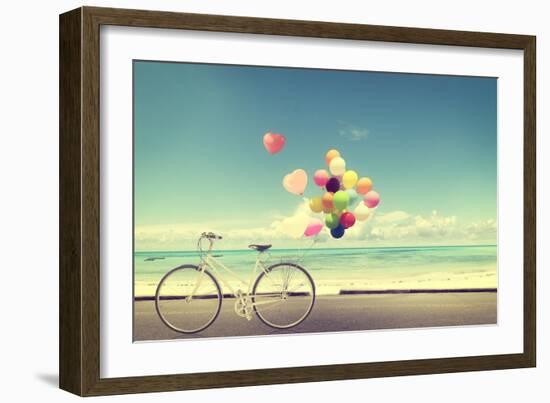 Bicycle Vintage with Heart Balloon on Beach Blue Sky Concept of Love in Summer and Wedding-jakkapan-Framed Photographic Print