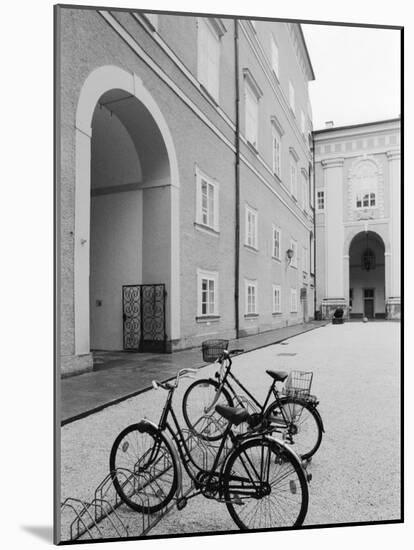 Bicycles in the Domplatz, Salzburg, Austria-Walter Bibikow-Mounted Photographic Print