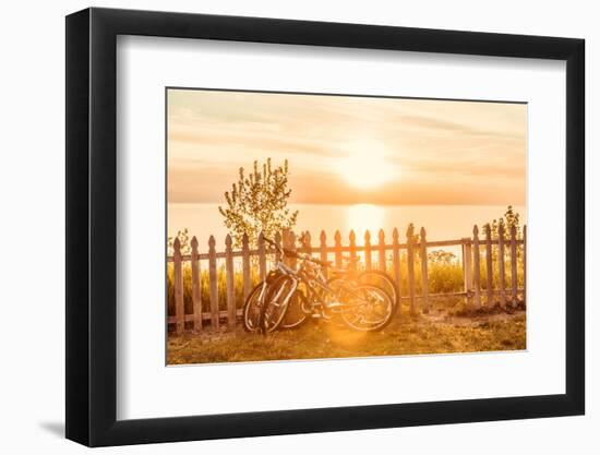 Bicycles Leaning on a Fence by the Beach-soupstock-Framed Photographic Print