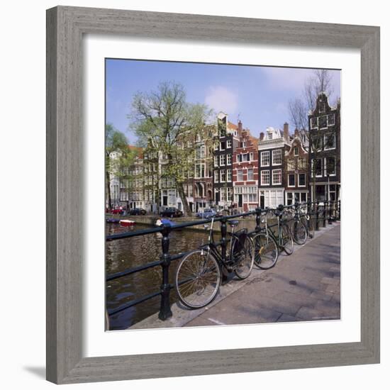 Bicycles on a Bridge Across the Canal at Herengracht in Amsterdam, Holland-Roy Rainford-Framed Photographic Print