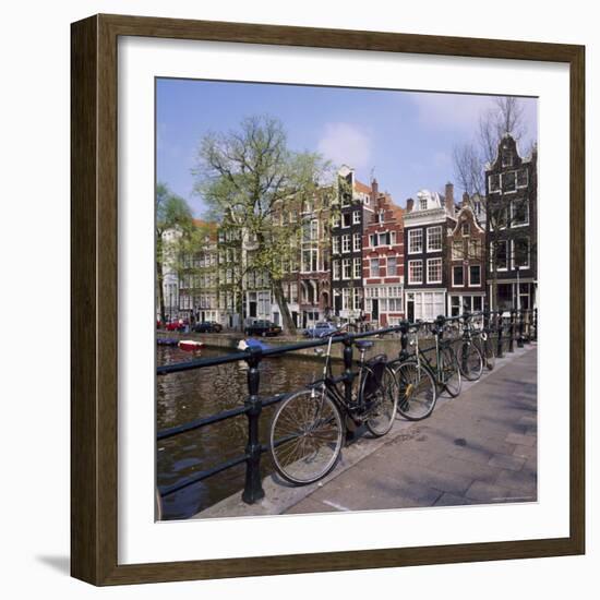 Bicycles on a Bridge Across the Canal at Herengracht in Amsterdam, Holland-Roy Rainford-Framed Photographic Print