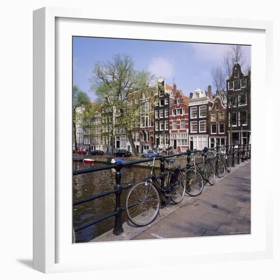 Bicycles on a Bridge Across the Canal at Herengracht in Amsterdam, Holland-Roy Rainford-Framed Photographic Print