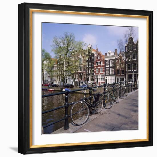 Bicycles on a Bridge Across the Canal at Herengracht in Amsterdam, Holland-Roy Rainford-Framed Photographic Print