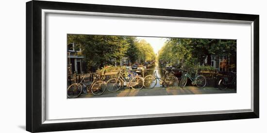 Bicycles on Bridge Over Canal, Amsterdam, Netherlands-null-Framed Photographic Print