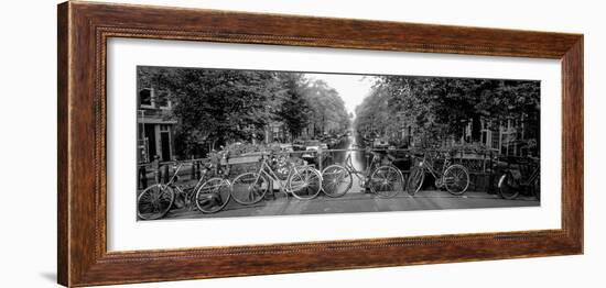 Bicycles on Bridge over Canal, Amsterdam, Netherlands-null-Framed Premium Photographic Print