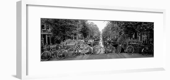 Bicycles on Bridge over Canal, Amsterdam, Netherlands-null-Framed Photographic Print