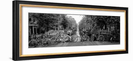 Bicycles on Bridge over Canal, Amsterdam, Netherlands-null-Framed Photographic Print