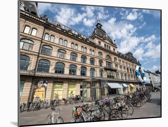 Bicycles parked in front of the Magasin du Nord department store, Copenhagen, Denmark, Scandinavia-Jean Brooks-Mounted Photographic Print