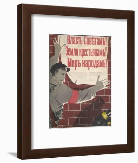 Big Brave Communist Worker Fixes a Poster on a Wall-null-Framed Photographic Print