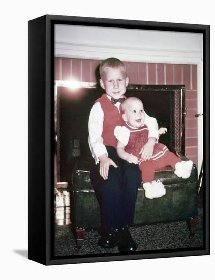 Big Brother Holds His Baby Sister for a Portrait, Ca. 1960.-Kirn Vintage Stock-Framed Premier Image Canvas