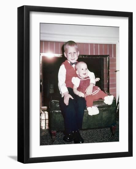 Big Brother Holds His Baby Sister for a Portrait, Ca. 1960.-Kirn Vintage Stock-Framed Photographic Print