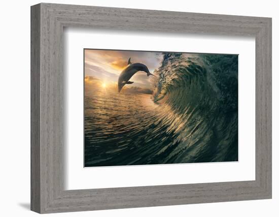 Big Ocean Breaking Wave and Sunset Dolphin Leaping.-Willyam Bradberry-Framed Photographic Print