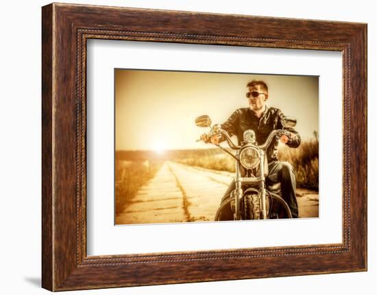 Biker Man Sits on a Bike-Andrey Armyagov-Framed Photographic Print