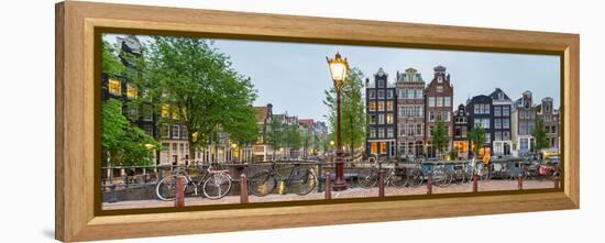 Bikes and Houses Along Canal at Dusk at Intersection of Herengracht and Brouwersgracht-null-Framed Stretched Canvas