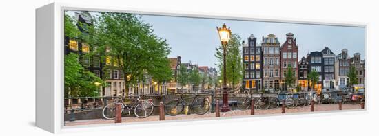 Bikes and Houses Along Canal at Dusk at Intersection of Herengracht and Brouwersgracht-null-Framed Stretched Canvas