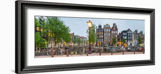 Bikes and Houses Along Canal at Dusk at Intersection of Herengracht and Brouwersgracht-null-Framed Photographic Print