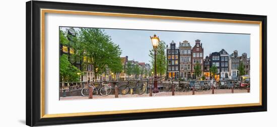 Bikes and Houses Along Canal at Dusk at Intersection of Herengracht and Brouwersgracht-null-Framed Photographic Print