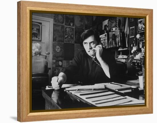 Bill Graham, Owner of Filmores East and West, Talking on Phone as He Works in His Office-John Olson-Framed Premier Image Canvas