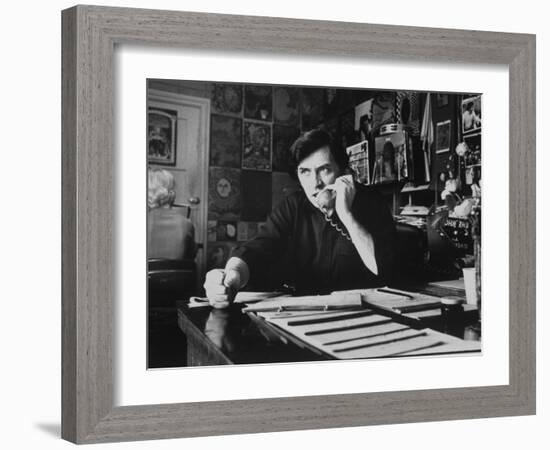 Bill Graham, Owner of Filmores East and West, Talking on Phone as He Works in His Office-John Olson-Framed Photographic Print